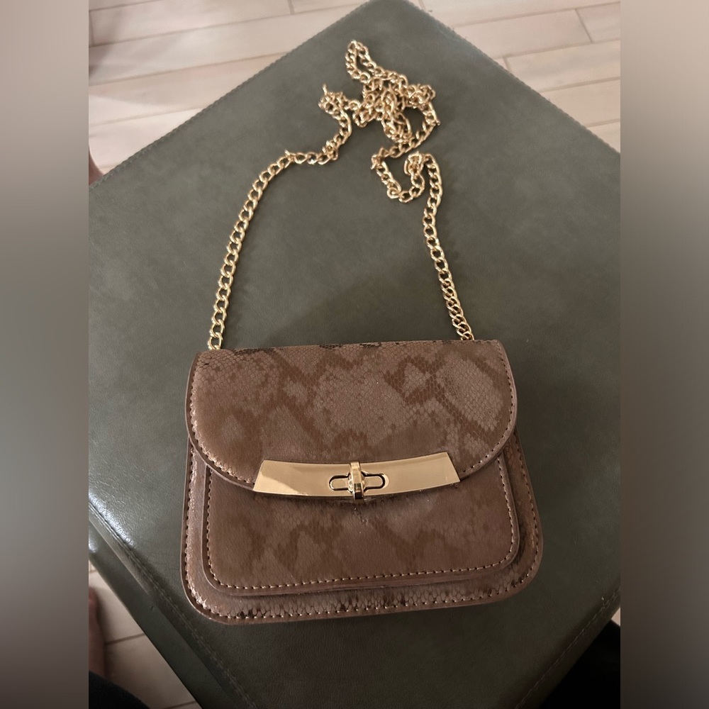 Little animal print, vegan leather crossbody bag.